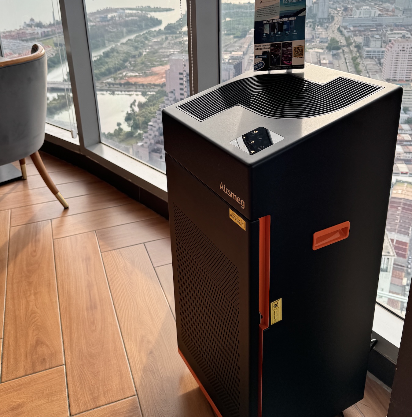 Commercial air purifier installed inside a high-rise workspace